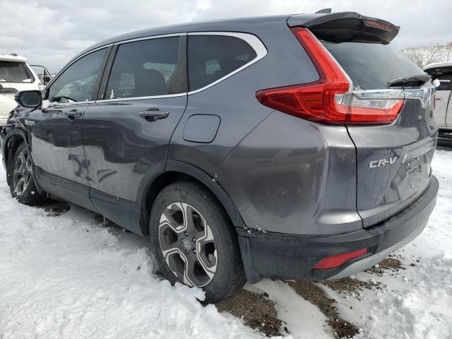 Photo 2 from auction – 2018 HONDA CR-V with VIN 7FARW2H89JE092129