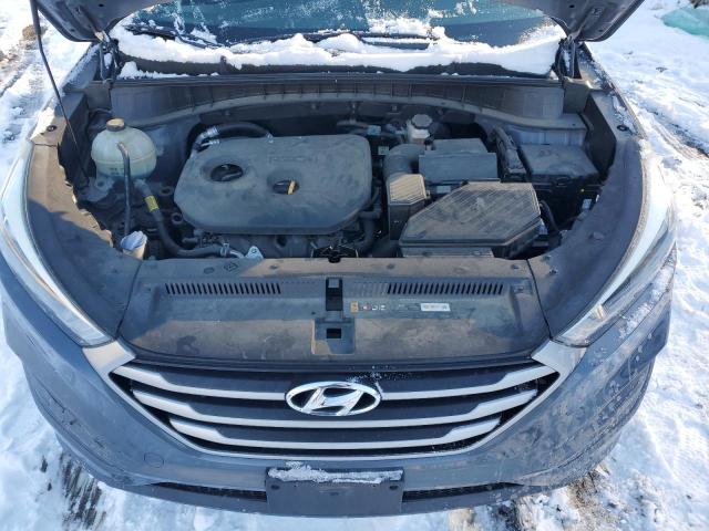 Photo 12 from auction – 2018 HYUNDAI TUCSON SE with VIN KM8J2CA4XJU703497