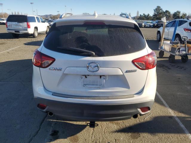 Photo 6 from auction – 2014 MAZDA CX-5 TOURI with VIN JM3KE2CYXE0334395