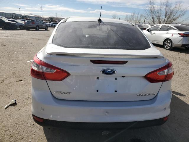 Photo 6 from auction – 2014 FORD FOCUS TITA with VIN 1FADP3J22EL161458