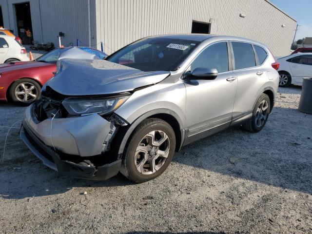 HONDA CR-V EX 2017 with VIN 7FARW1H52HE031134 - Photo from auction