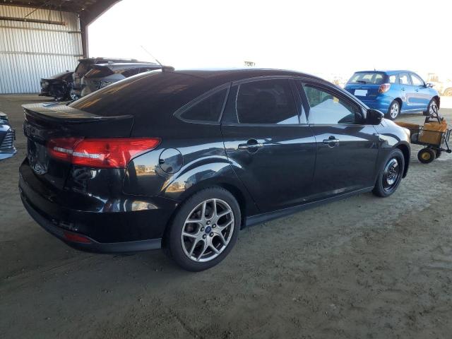 Photo 3 from auction – 2015 FORD FOCUS SE with VIN 1FADP3F2XFL275671