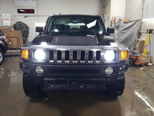 Photo 5 from auction – 2007 HUMMER H3 with VIN 5GTDN13E578119621