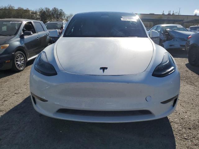 Photo 5 from auction – 2023 TESLA MODEL Y with VIN 7SAYGAEE3PF661254