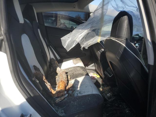 Photo 10 from auction – 2022 TESLA MODEL 3 with VIN 5YJ3E1EC7NF265756