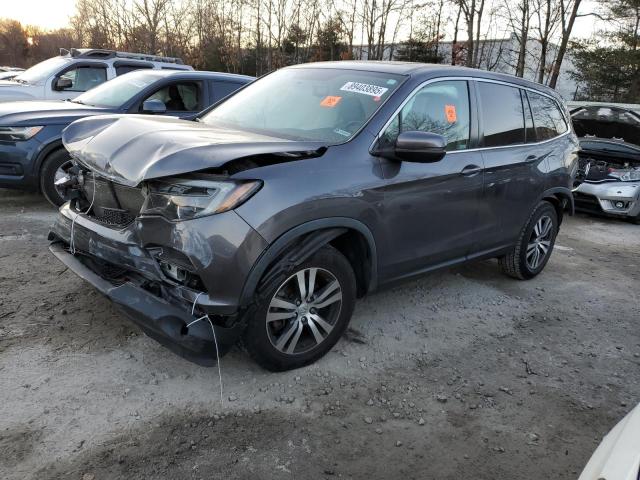 HONDA PILOT EXL 2018 with VIN 5FNYF6H57JB031818 - Photo from auction
