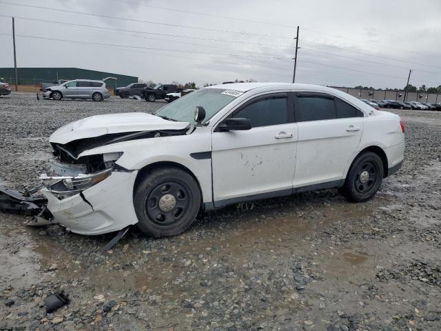 FORD TAURUS POL 2015 with VIN 1FAHP2MK5FG105015 - Photo from auction