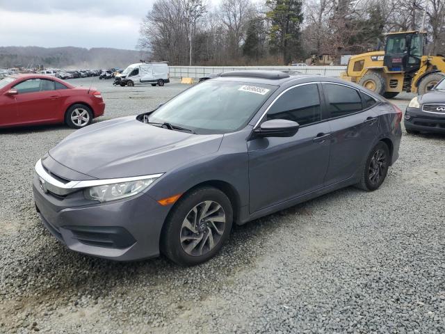 HONDA CIVIC EX 2018 with VIN 2HGFC2F7XJH604509 - Photo from auction