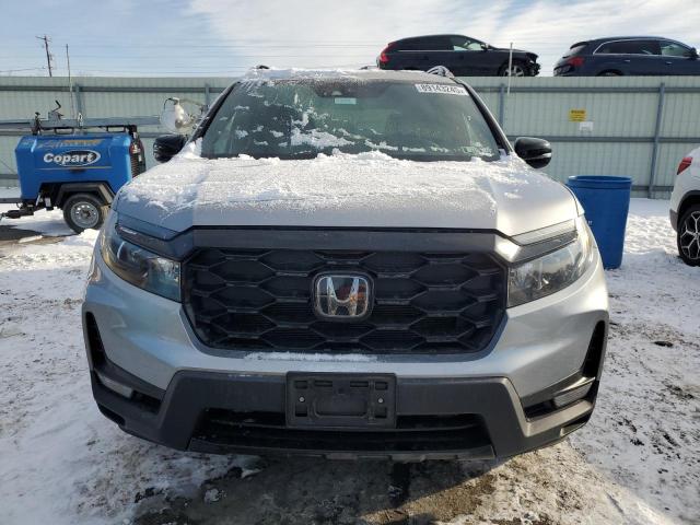 Photo 5 from auction – 2022 HONDA PASSPORT E with VIN 5FNYF8H09NB006215