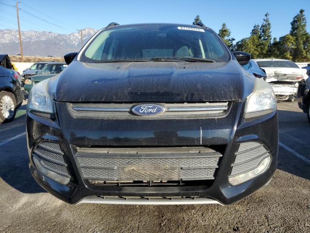 Photo 5 from auction – 2016 FORD ESCAPE SE with VIN 1FMCU0GX2GUB60352