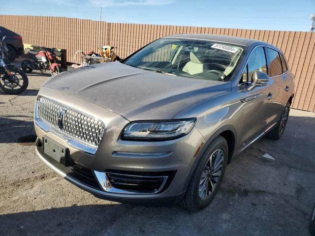 LINCOLN NAUTILUS 2020 with VIN 2LMPJ6J94LBL34174 - Photo from auction