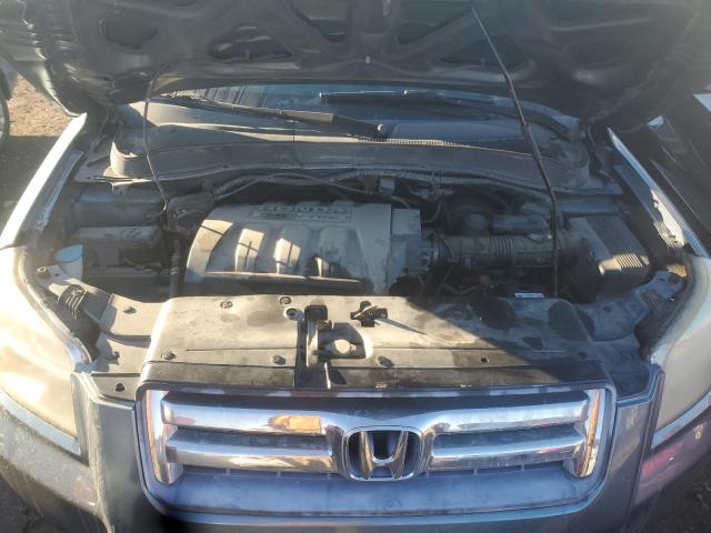 Photo 11 from auction – 2006 HONDA PILOT EX with VIN 2HKYF18706H527332