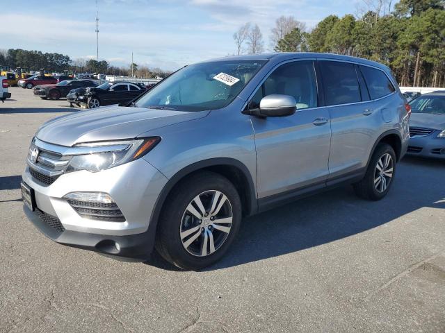 HONDA PILOT EXL 2016 with VIN 5FNYF5H54GB025834 - Photo from auction