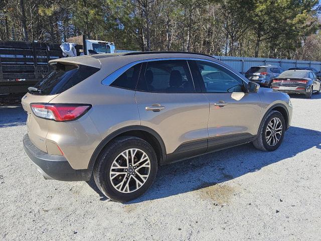 Photo 3 from auction – 2021 FORD ESCAPE SEL with VIN 1FMCU9H63MUA64686