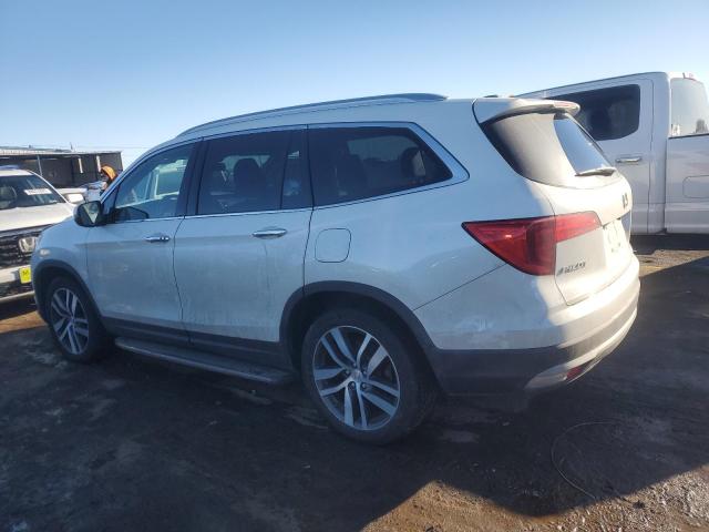 Photo 2 from auction – 2018 HONDA PILOT ELIT with VIN 5FNYF6H04JB052601
