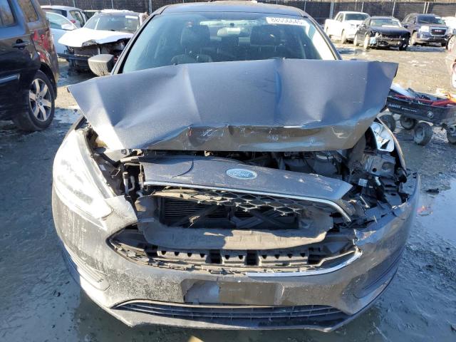 Photo 5 from auction – 2016 FORD FOCUS S with VIN 1FADP3E23GL390003