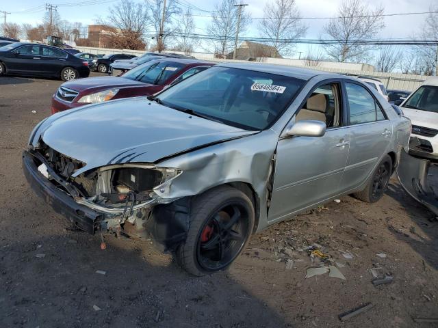 TOYOTA CAMRY LE 2004 with VIN 4T1BE32K04U289658 - Photo from auction