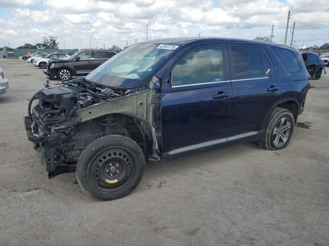 HONDA PILOT EXL 2023 with VIN 5FNYG2H5XPB005695 - Photo from auction