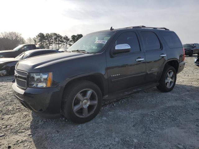 CHEVROLET TAHOE C150 2011 with VIN 1GNSCAE04BR354382 - Photo from auction