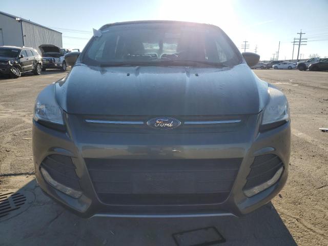 Photo 5 from auction – 2016 FORD ESCAPE SE with VIN 1FMCU0G75GUB98593