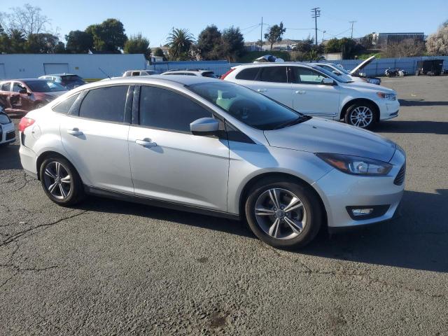 Foto 4 de la subasta – 2018 FORD FOCUS SE con VIN 1FADP3FE7JL224423