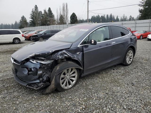 TESLA MODEL X 2020 with VIN 5YJXCBE26LF304435 - Photo from auction