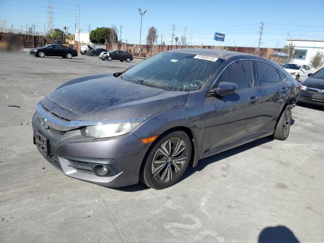 HONDA CIVIC EX 2017 with VIN 2HGFC1F3XHH631887 - Photo from auction