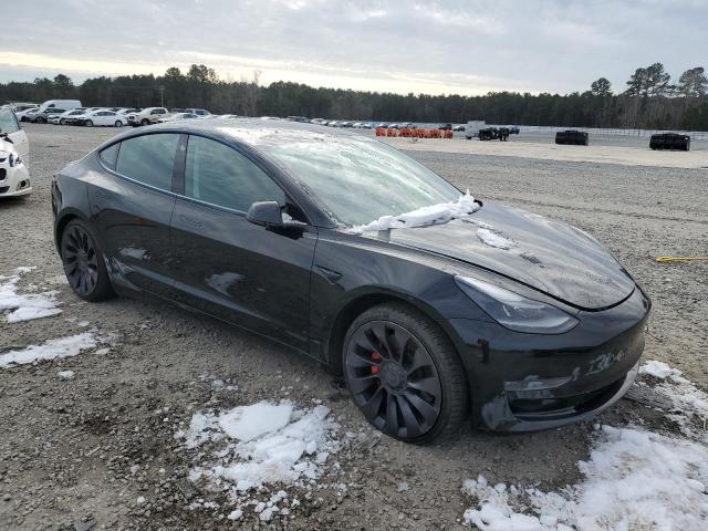 Photo 4 from auction – 2021 TESLA MODEL 3 with VIN 5YJ3E1ECXMF925383