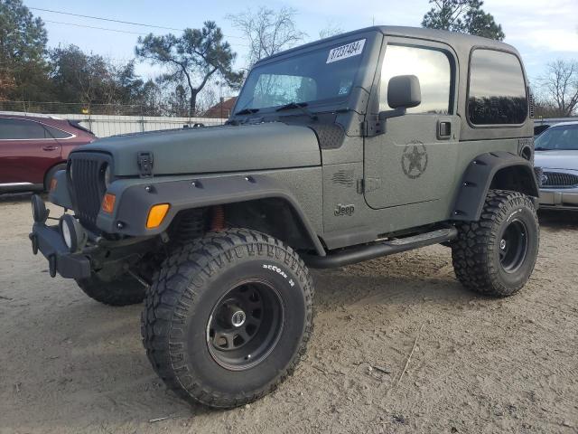JEEP WRANGLER / 2002 with VIN 1J4FA49S22P702845 - Photo from auction