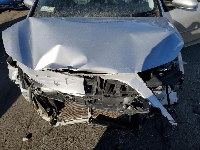Photo 11 from auction – 2022 TOYOTA PRIUS PRIM with VIN JTDKAMFP3N3204119