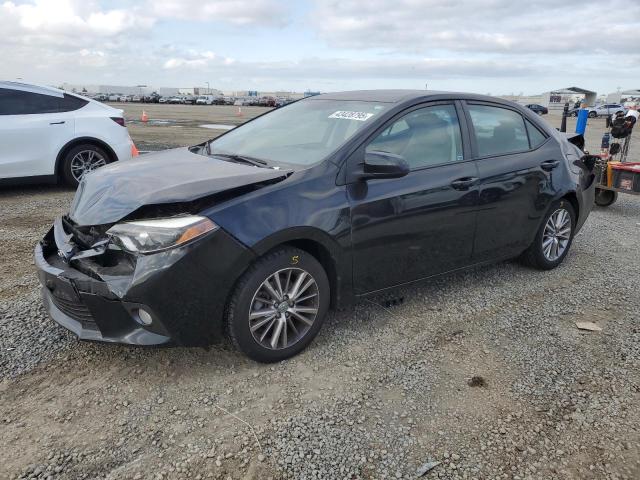 TOYOTA COROLLA L 2015 with VIN 5YFBURHE6FP305373 - Photo from auction