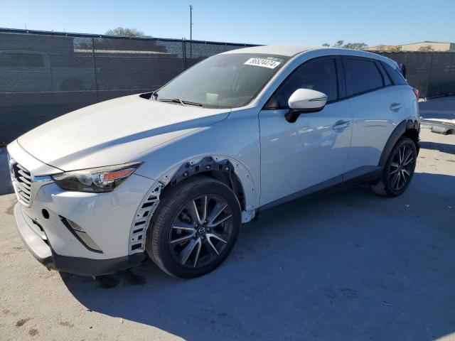 MAZDA CX-3 TOURI 2018 مع رقم تعريف المركبة JM1DKDC77J0305749 - صورة من المزاد
