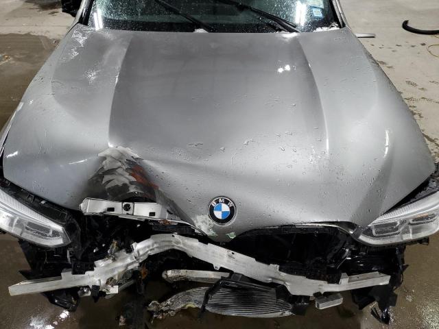 Photo 12 from auction – 2021 BMW X4 M COMPE with VIN 5YMUJ0C05M9E04935