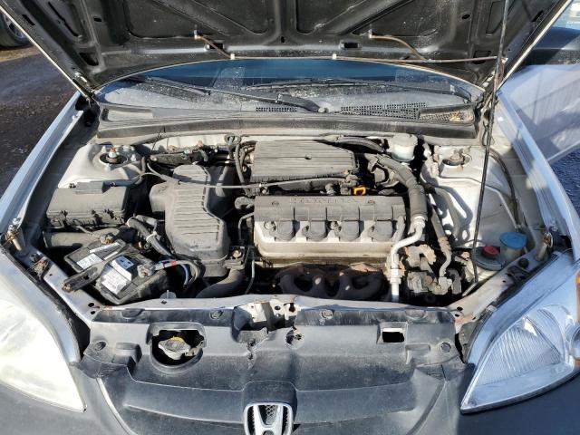 Photo 11 from auction – 2002 HONDA CIVIC LX with VIN 1HGEM225X2L814271