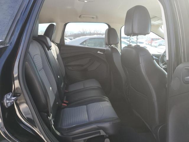 Photo 11 from auction – 2017 FORD ESCAPE TIT with VIN 1FMCU9J98HUD06382
