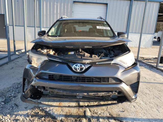 Photo 5 from auction – 2017 TOYOTA RAV4 LE with VIN JTMZFREV6HJ706118