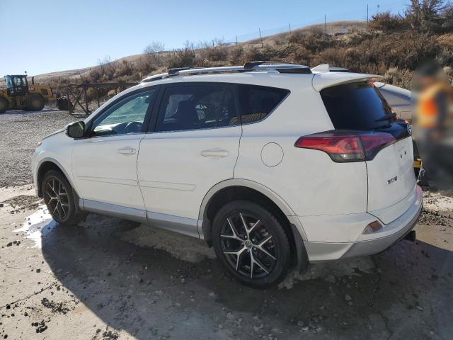 Photo 2 from auction – 2016 TOYOTA RAV4 SE with VIN JTMJFREV1GJ053693