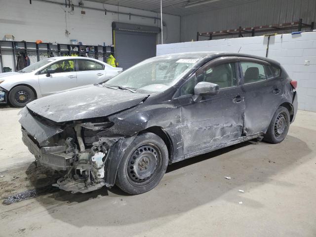 SUBARU IMPREZA 2019 with VIN 4S3GTAA61K3711982 - Photo from auction