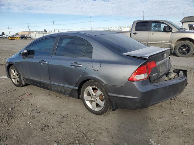 Photo 2 from auction – 2011 HONDA CIVIC LX-S with VIN 19XFA1F67BE036951