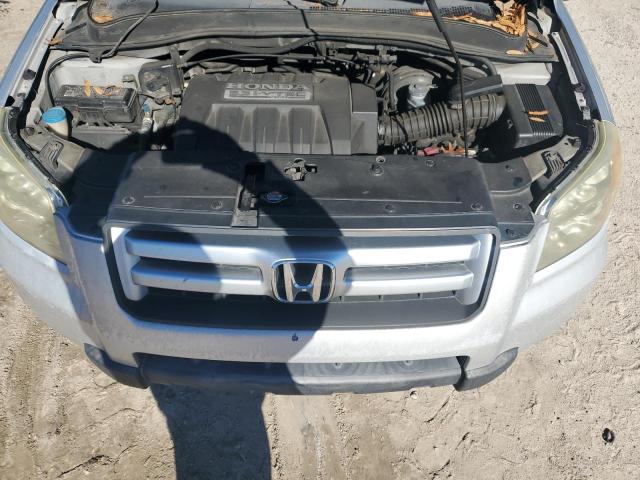 Photo 12 from auction – 2006 HONDA PILOT EX with VIN 5FNYF28466B045054