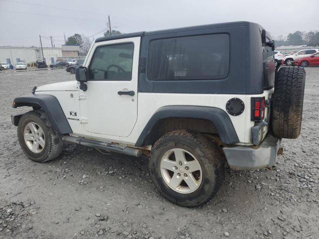 Photo 2 from auction – 2009 JEEP WRANGLER X with VIN 1J4FA24139L763500