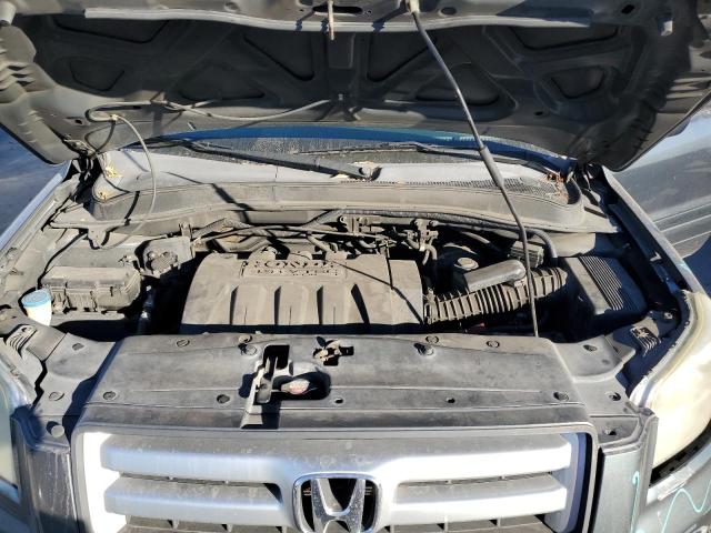 Photo 12 from auction – 2006 HONDA PILOT EX with VIN 5FNYF28566B041174