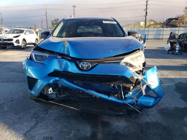 Photo 5 from auction – 2017 TOYOTA RAV4 LE with VIN JTMZFREV8HJ142942