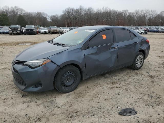 TOYOTA COROLLA L 2017 with VIN 5YFBURHE2HP582976 - Photo from auction