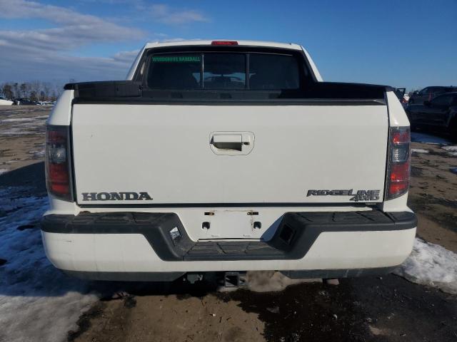 Photo 6 from auction – 2014 HONDA RIDGELINE with VIN 5FPYK1F61EB009773