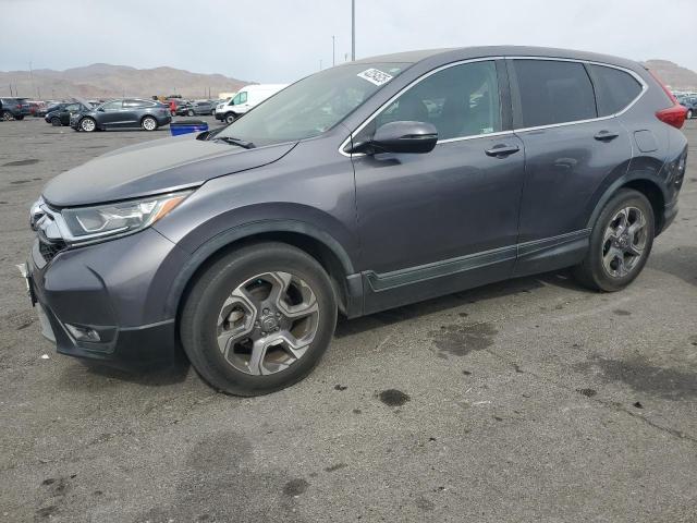 HONDA CR-V EX 2018 with VIN 7FARW1H58JE018300 - Photo from auction