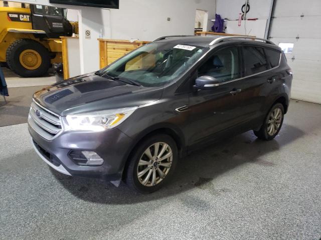 FORD ESCAPE TIT 2017 with VIN 1FMCU9J98HUA68677 - Photo from auction