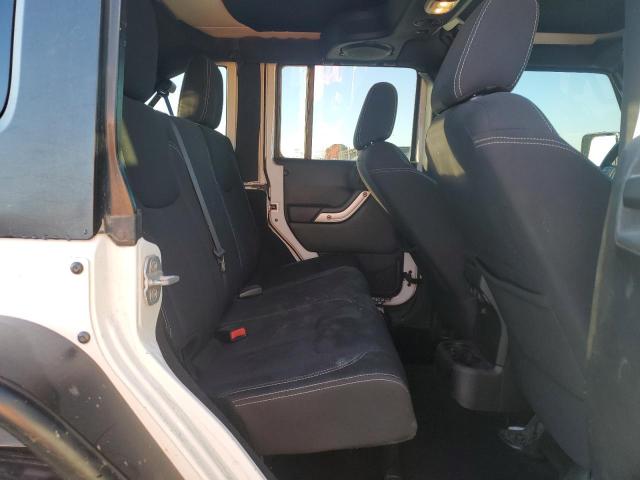 Photo 11 from auction – 2013 JEEP WRANGLER U with VIN 1C4BJWFG4DL504410