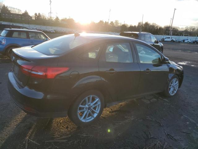 Photo 3 from auction – 2015 FORD FOCUS SE with VIN 1FADP3F24FL222285