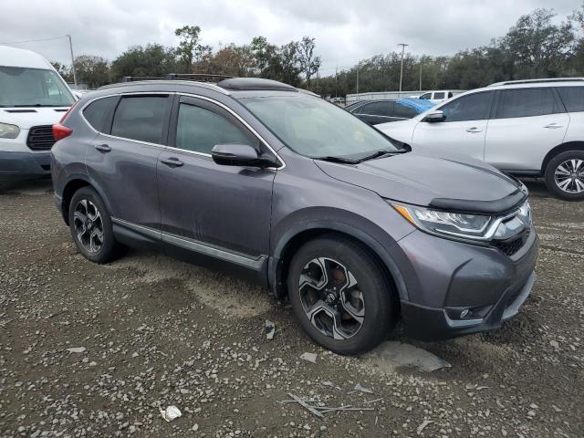 Photo 4 from auction – 2017 HONDA CR-V TOURI with VIN 7FARW1H99HE035362